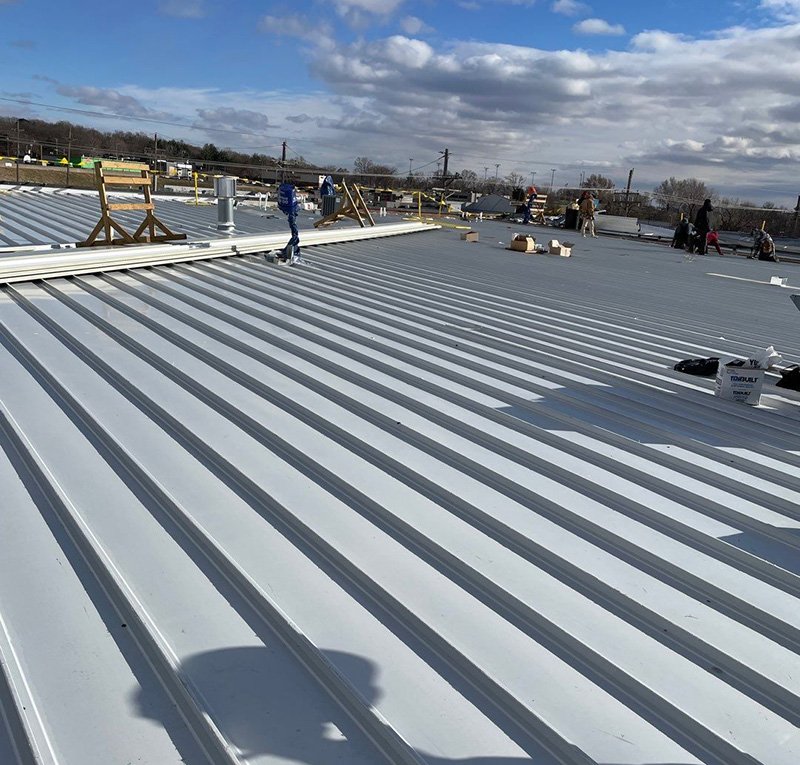 commercial metal roofing installation with the anchor roofing team