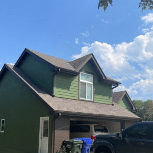 After photos of a recent storm damage roof replacement by Anchor Roofing in Omaha