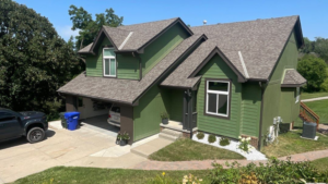 After photos of a recent storm damage roof replacement by Anchor Roofing in Omaha