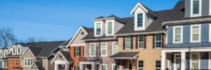 Several houses with different roof colors that have been installed by roofing companies in Mmaha