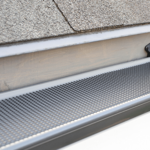 Different types of gutter leaf guards shown for comparison