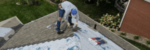 Roofing contractor installing the best shingles for roof by Anchor Roofing in Omaha