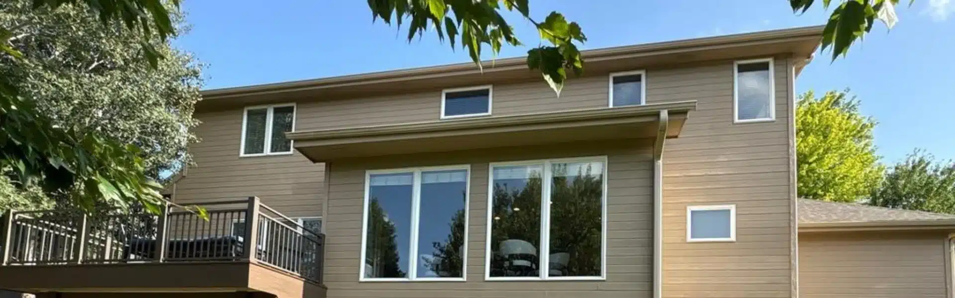 Energy-efficient siding enhancing comfort and reducing drafts on Omaha home by Anchor Roofing in Omaha