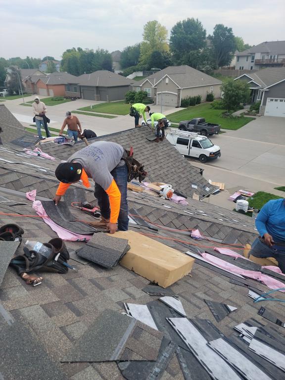 Residential roof repair and inspection project being completed by Anchor Roofing