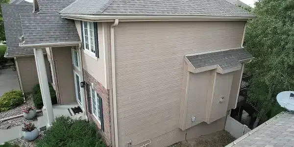 Professional siding contractor installing high-quality residential siding by Anchor Roofing in Omaha