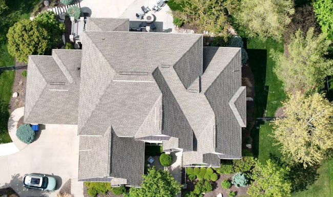 Arial view of a light gray shingle roof replacement in Omaha by Anchor Roofing