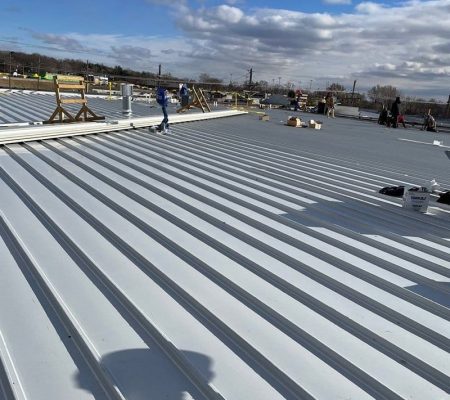 commercial metal roofing installation with the anchor roofing team